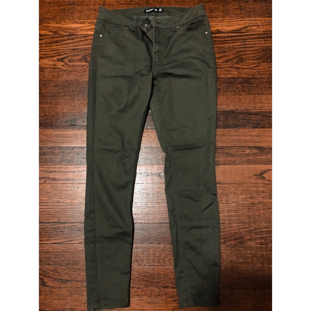 Dark olive green pants.